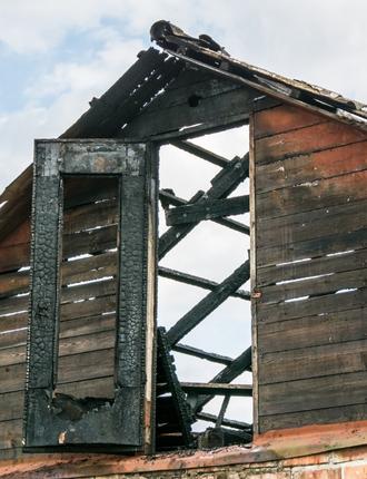 image of a burnt facade of a house forestville ca